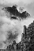 portfolio stock photography | Huangshan Mountains, Xihai (West Sea) Grand Canyon, Baiyun Scenic Area, Huangshan (Yellow Mountains), China, Image ID CHINA-BW-0007. The Yellow Mountain or Huangshan in Chinese may not be well known abroad but its breathtaking landscapes have inspired the creation of vast Chinese paintings and poems. For some, the Yellow Mountain is considered the top mountain below heaven, which is important. In the valley, the ancient villages of Hongcun and Xidi are among the most beautiful rural villages in China. Huangshan is depicted by artists as one of the most beautiful places in China. Having served as a model for many paintings, Yellow Mountain is also the subject of many great poems. Xu Xiake, who traveled to Huangshan for several times, said in admiration, 'Who has seen the five sacred mountains has no desire to know the other peaks; who saw Huangshan Mountain has experienced a moment of pleasure watching these five sacred mountains.'