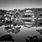 portfolio stock photography | Kinkakuji - Golden Pavilion, Kyoto, Kansai, Honshu, Japan, Image ID JAPAN-KYOTO-GOLDEN-PAVILION-0001. Kinkakuji (also known as 'Golden Temple' or 'Golden Pavilion') is one of Kyoto's best-known attractions. It was built in 1393 as a retirement villa for Shogun Yoshimitsu Ashikaga. He intended to cover the exterior with gold, but only managed to coat the the ceiling of the third floor with gold leaf before his death. After his death, his son converted the building into a Zen temple of the Rinzai school named Rokuonji, in accordance with Ashikaga's wishes.