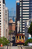 usa stock photography | Cable Car on The California Street , San Francisco, California, USA, Image ID US-SAN-FRANCISCO-0004. The California Street cable car line runs due east from Van Ness Avenue to the waterfront Embarcadero on California Street between Mason Street and Powell Street.